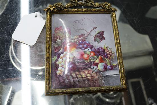 An early 19th century enamel plaque decorated with a still life of fruit 11.5 x 9.5cm